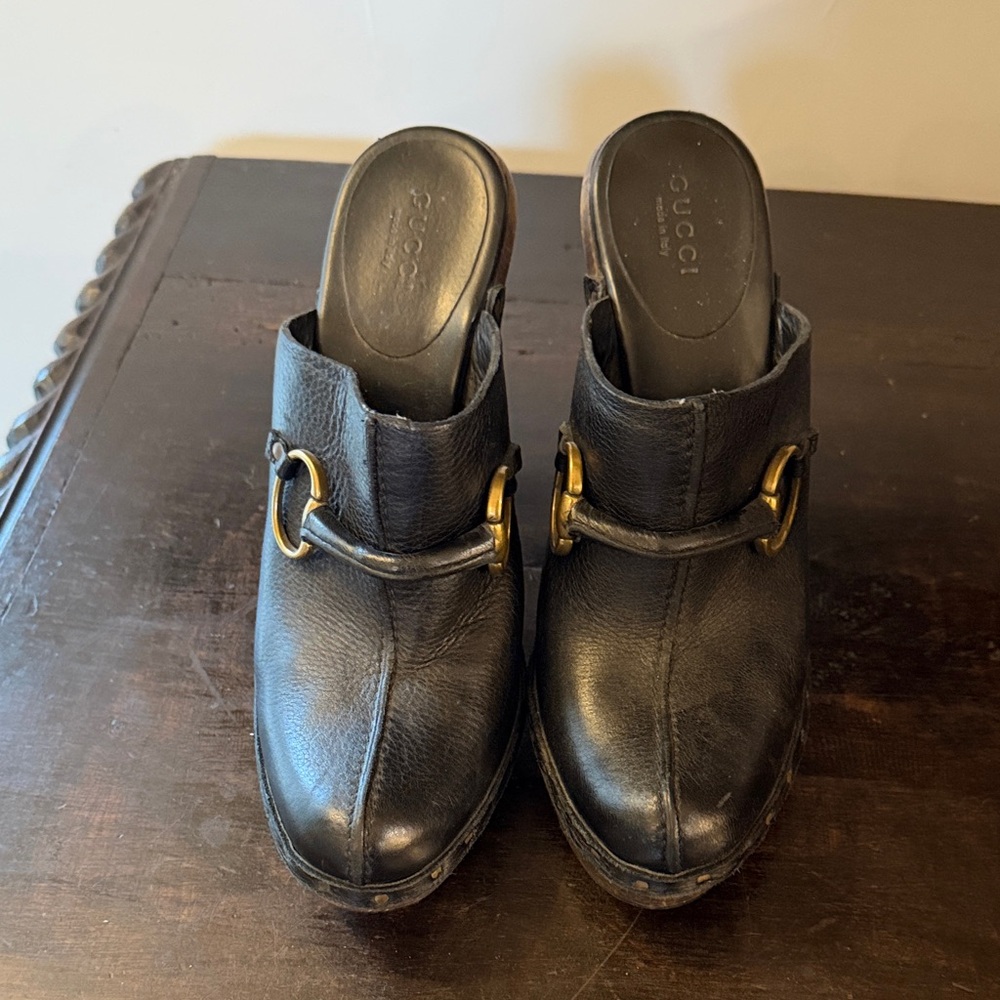 Gucci Black Leather Mules with Gold Accents